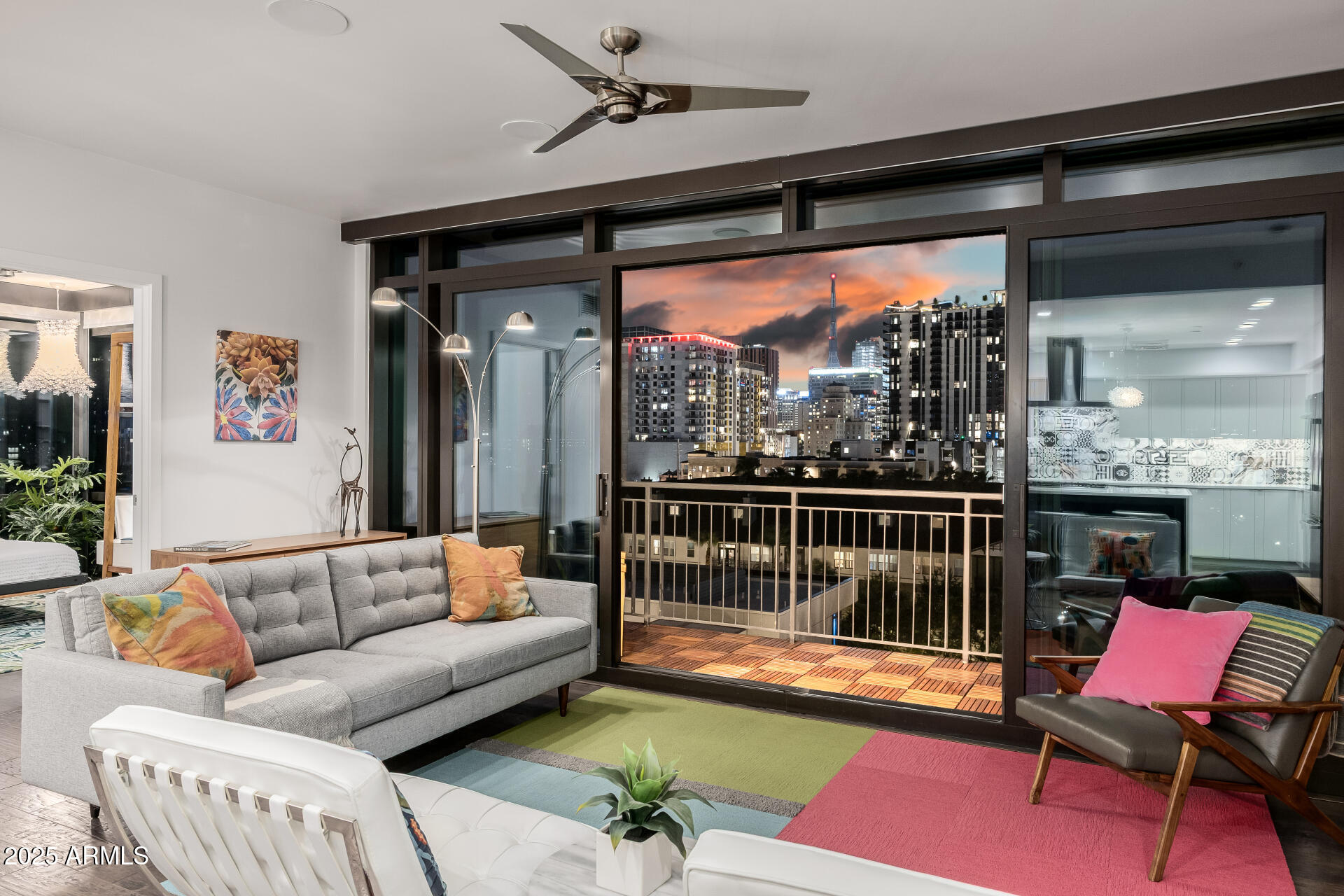200 West Portland Street, Unit 827 Phoenix, AZ 85003 - Photo 81 of 111 a living room with furniture and a floor to ceiling window