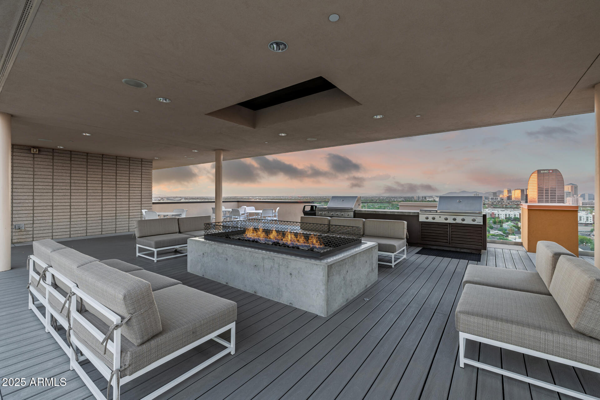 200 West Portland Street, Unit 827 Phoenix, AZ 85003 - Photo 86 of 111 a living room with furniture and wooden floor