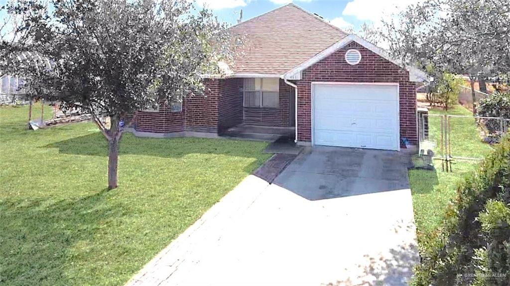 483 Whalen Road San Benito, TX 78586 - Photo 1 of 10 a view of a house with a yard