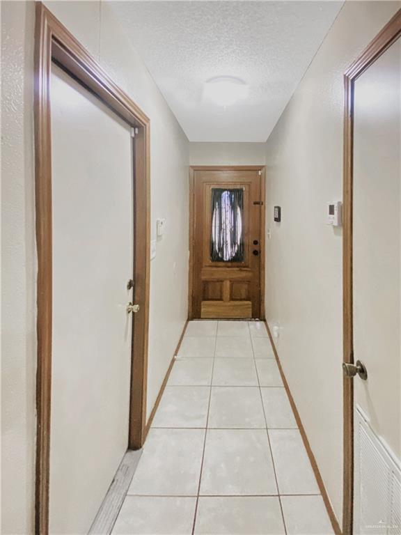 483 Whalen Road San Benito, TX 78586 - Photo 6 of 10 a view of a hallway