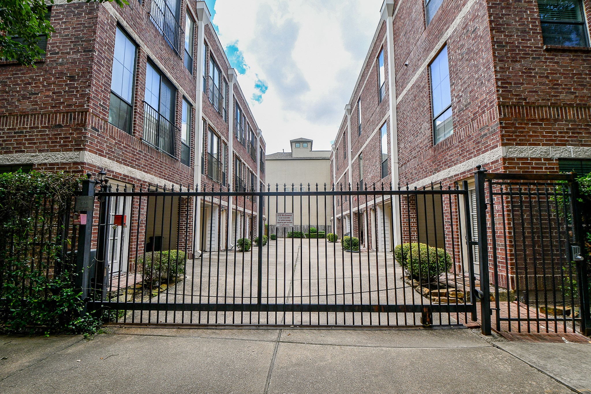 118 McGowen Street, Unit K Houston, TX 77006 - Photo 3 of 32 Welcome to your next home in gated community end unit right next to community common area where you can enjoy BBQ and gatherings or maybe some gardening