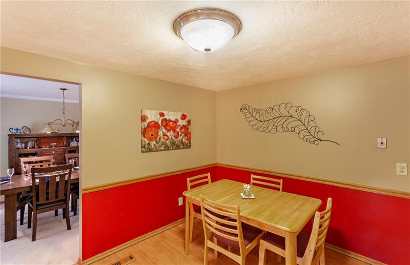 8284 Post Road Allison Park, PA 15101 - Photo 13 of 23 Eat in kitchen opens to the dining room.
