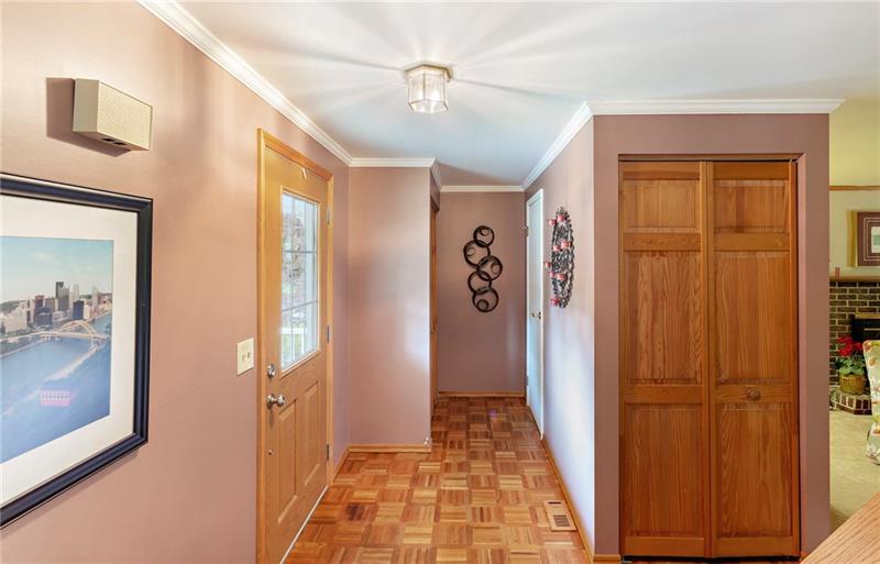 8284 Post Road Allison Park, PA 15101 - Photo 15 of 23 The Foyer welcomes guests and leads to two closets and the powder room in the rear.