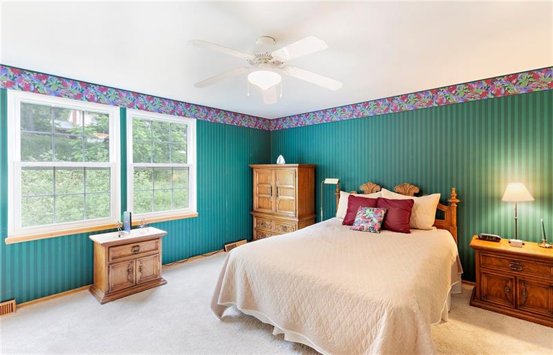 8284 Post Road Allison Park, PA 15101 - Photo 19 of 23 The master bedroom is complete with its own full bathroom and a large closet. Ceiling fans in all four bedrooms.