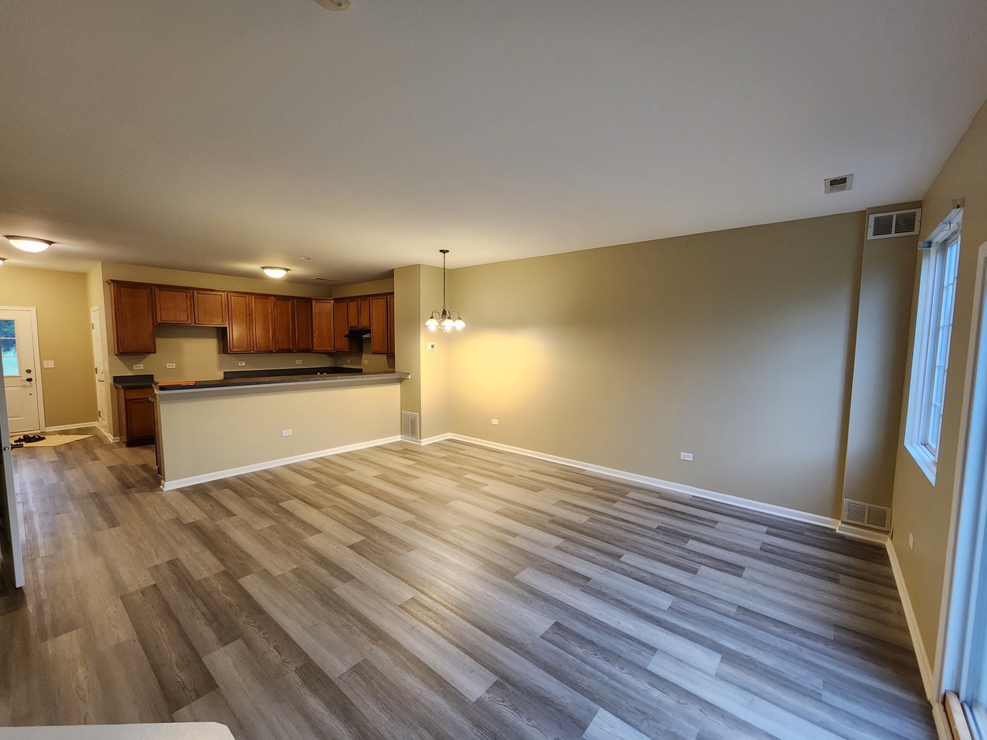 618 Caleb Drive, Unit 618 Ottawa, IL 61350 - Photo 4 of 10 a view of a kitchen with a sink and a refrigerator
