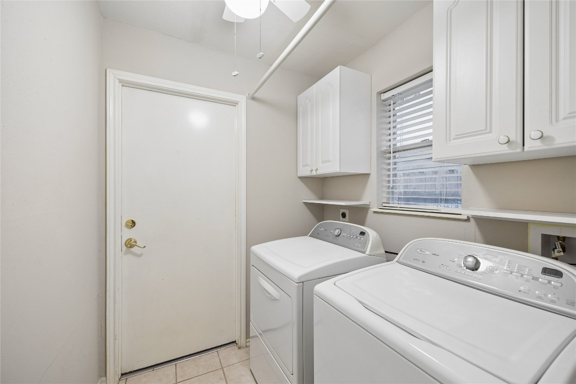 24919 Bovington Drive Spring, TX 77389 - Photo 18 of 21 The laundry room leads you into the 2-car garage.