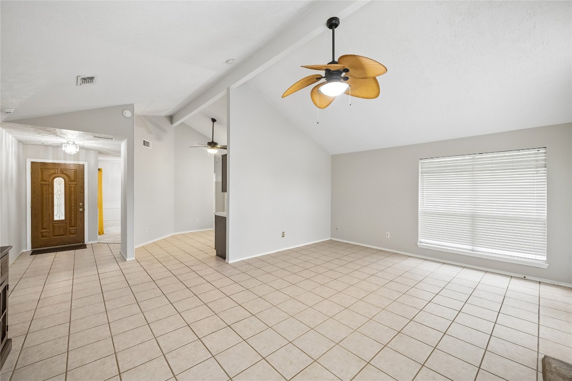 24919 Bovington Drive Spring, TX 77389 - Photo 4 of 21 Tons of natural light pours into the living room.