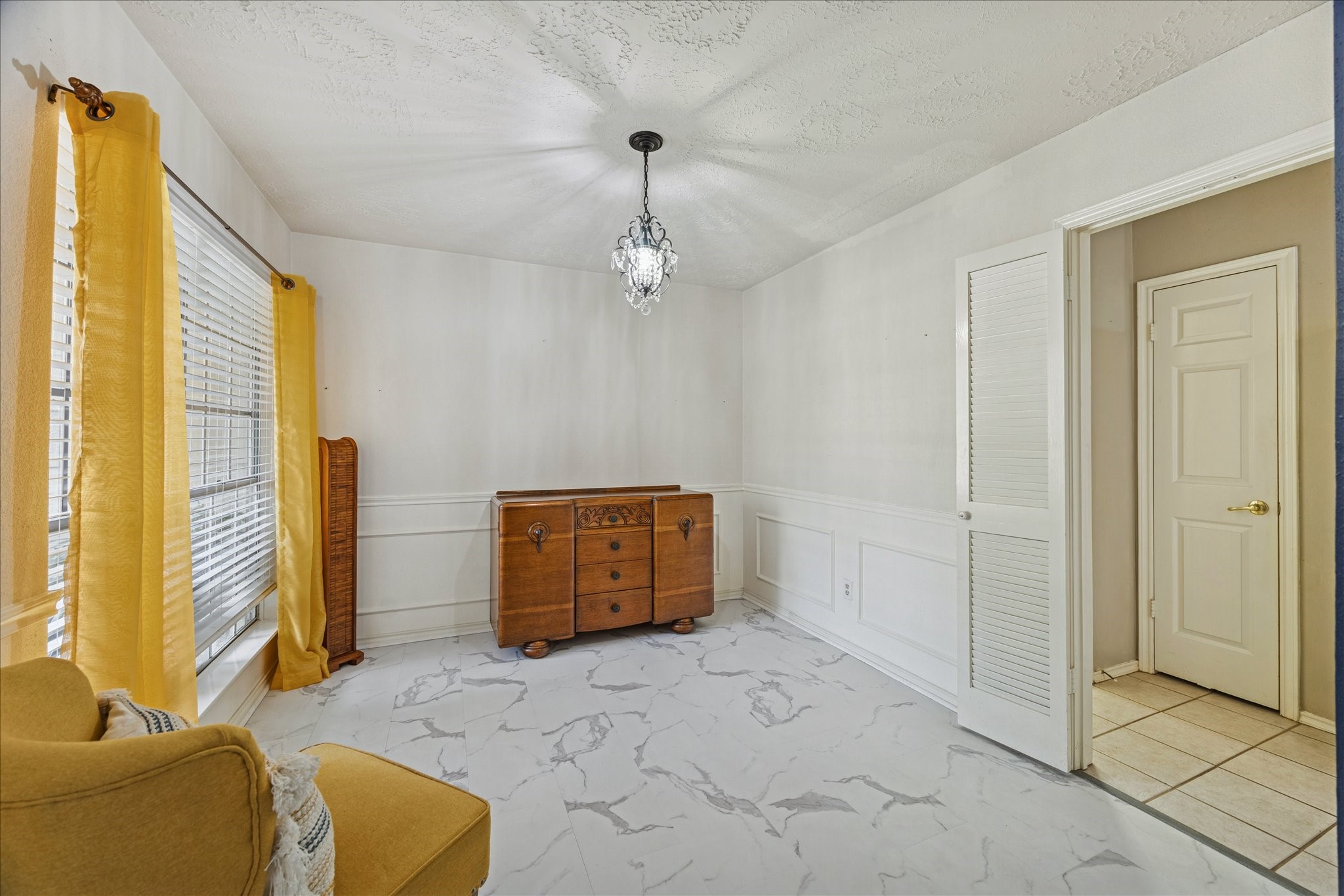 24919 Bovington Drive Spring, TX 77389 - Photo 7 of 21 Dining room with upgraded tile floors.