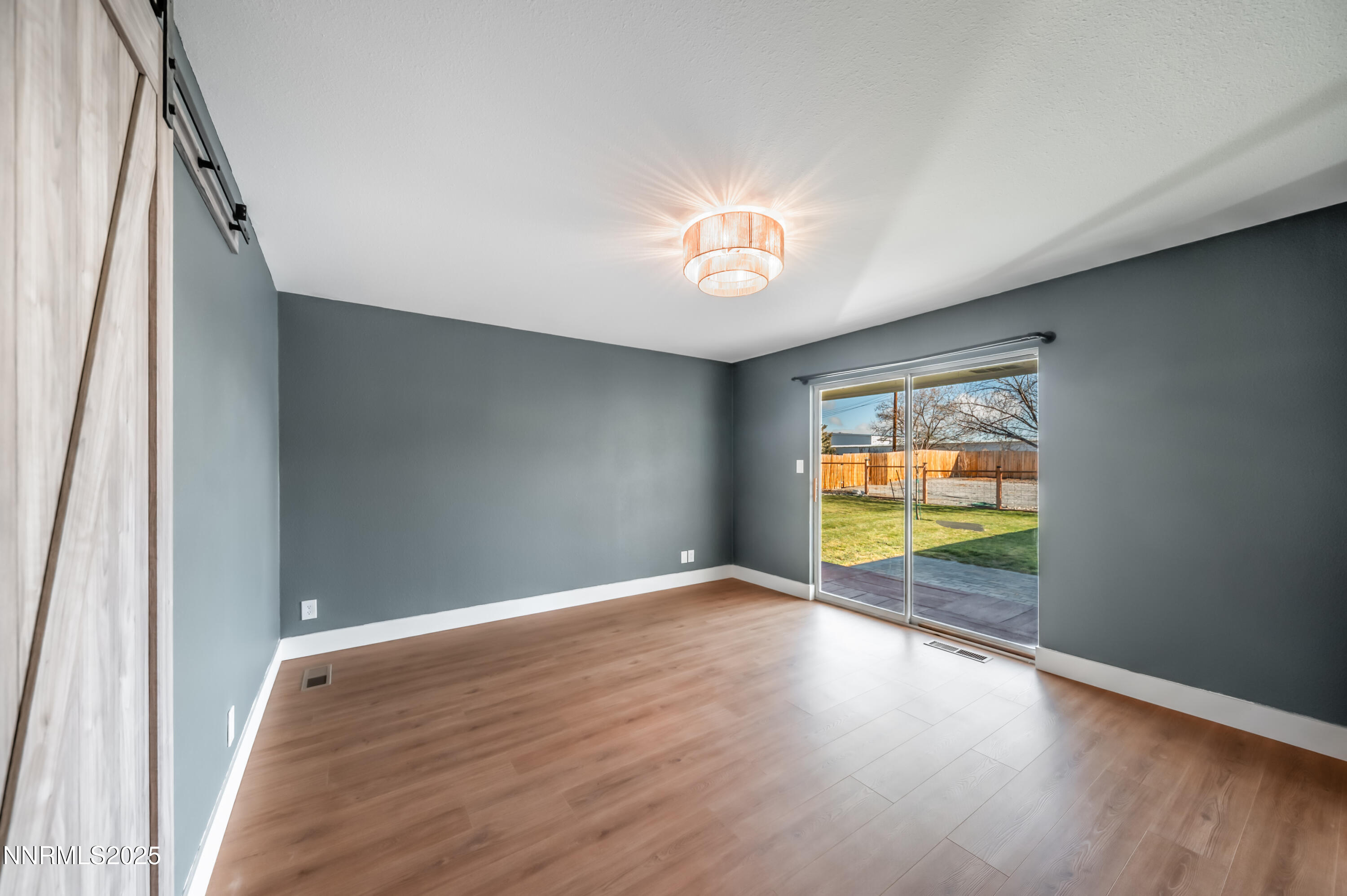 11675 Heartpine Street Reno, NV 89506 - Photo 16 of 38 a view of an empty room with a window