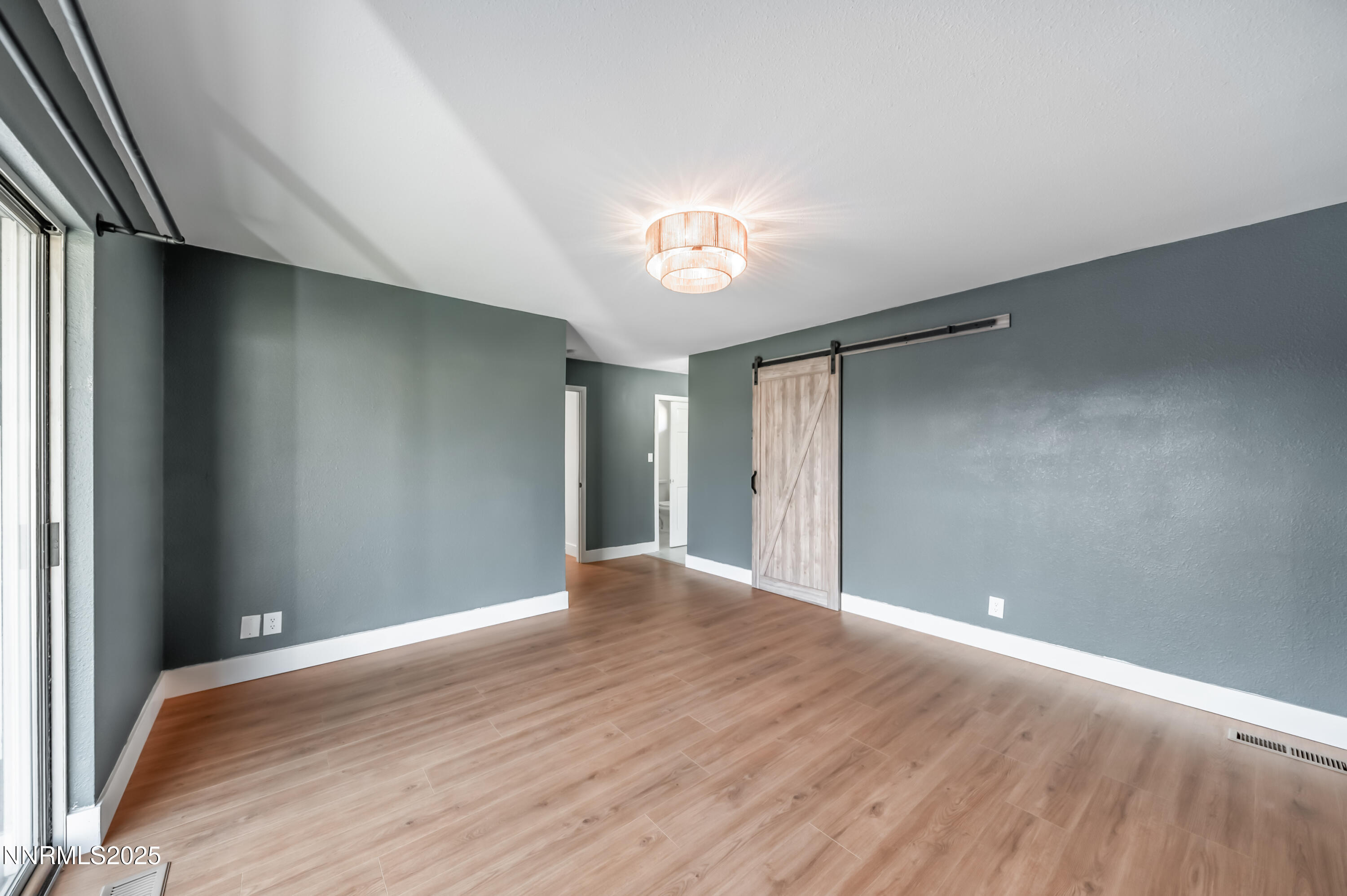 11675 Heartpine Street Reno, NV 89506 - Photo 17 of 38 a view of an empty room with a window
