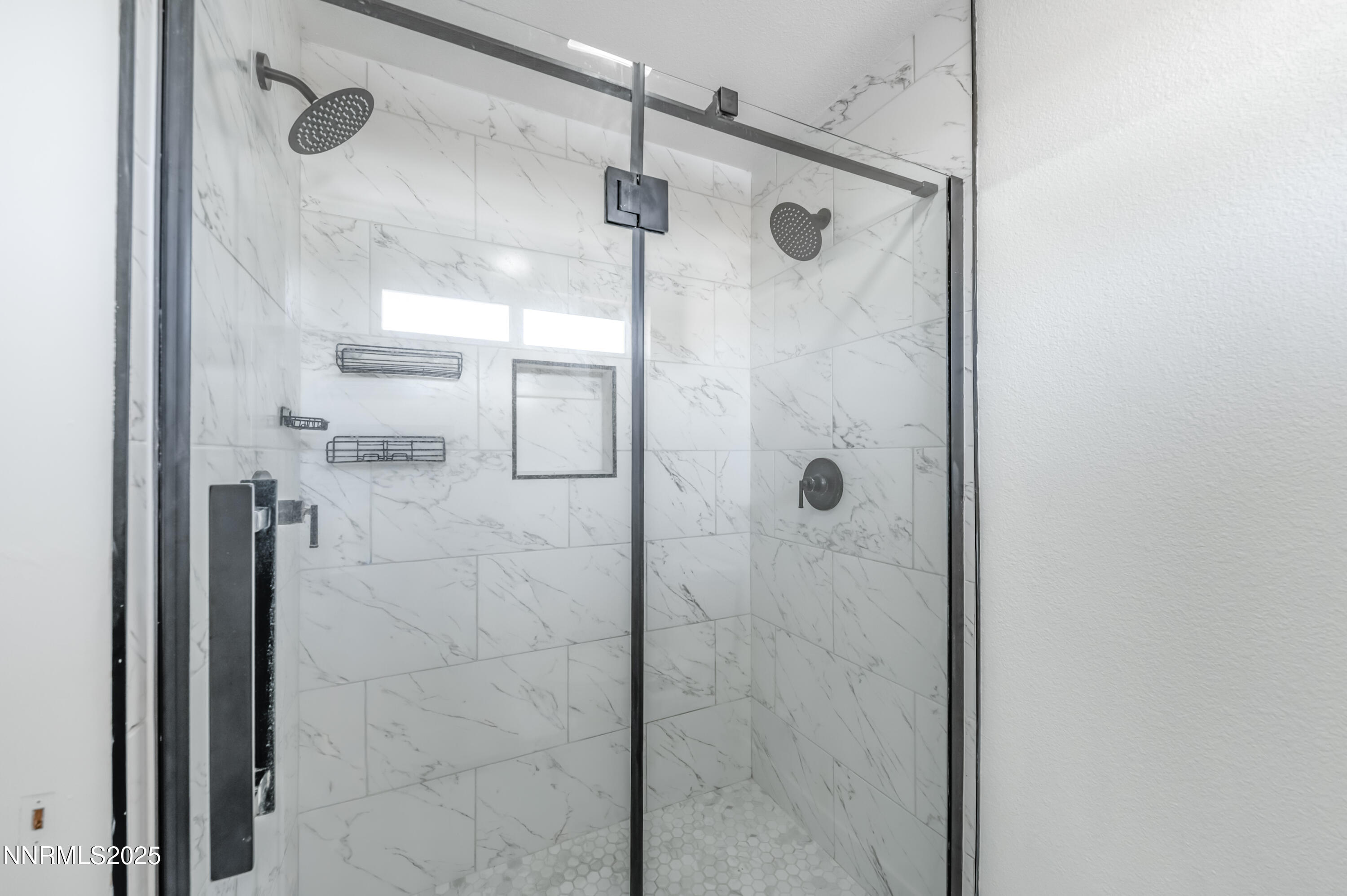 11675 Heartpine Street Reno, NV 89506 - Photo 19 of 38 a bathroom with a shower