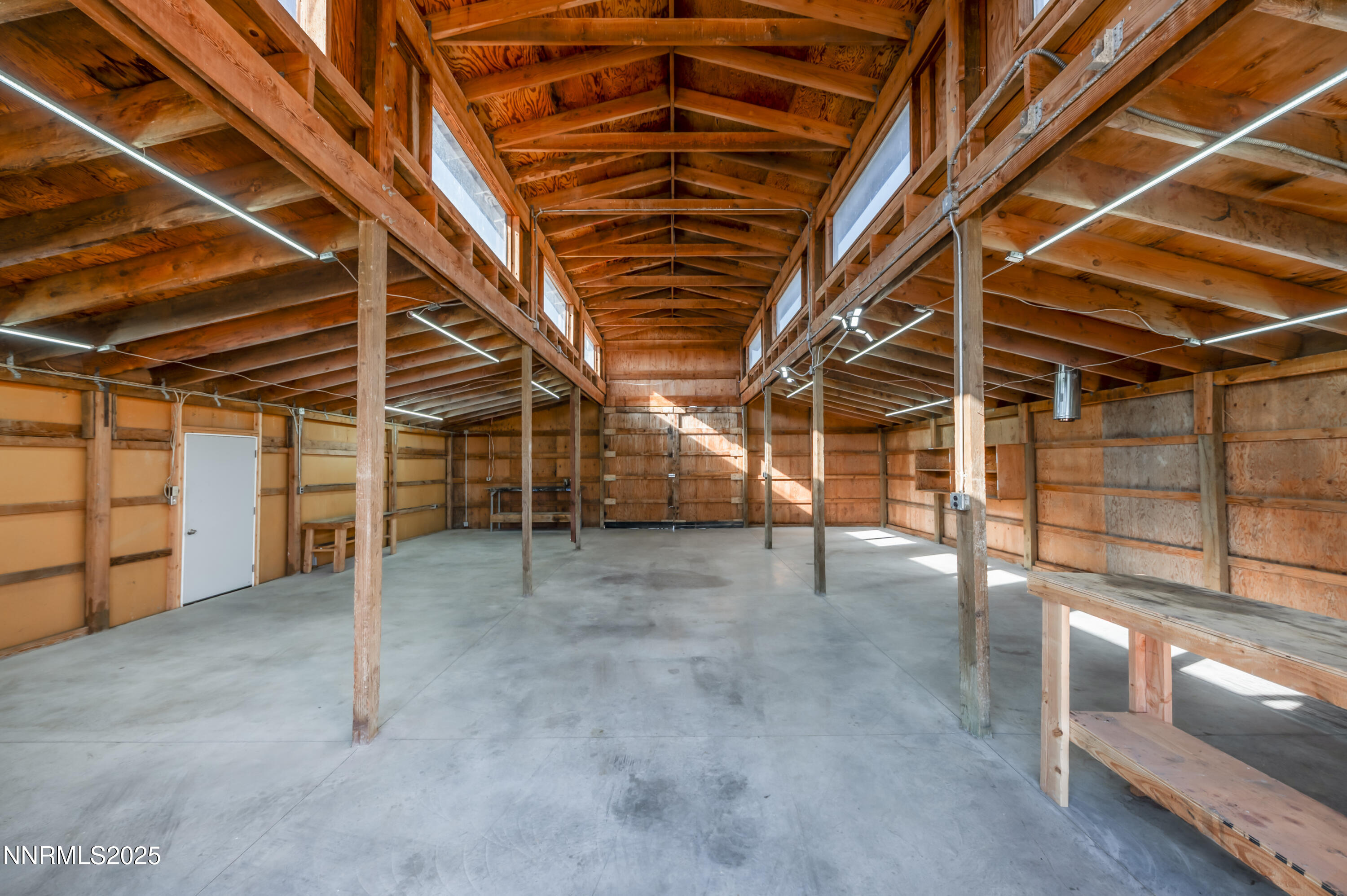 11675 Heartpine Street Reno, NV 89506 - Photo 28 of 38 a view of an empty room with wooden walls