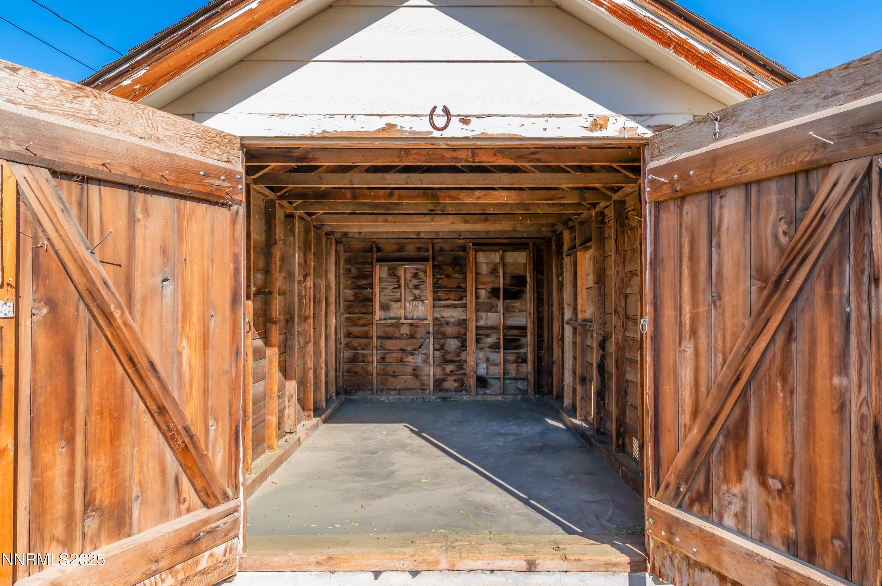 11675 Heartpine Street Reno, NV 89506 - Photo 32 of 38 a view of a porch with wooden floor and stairs