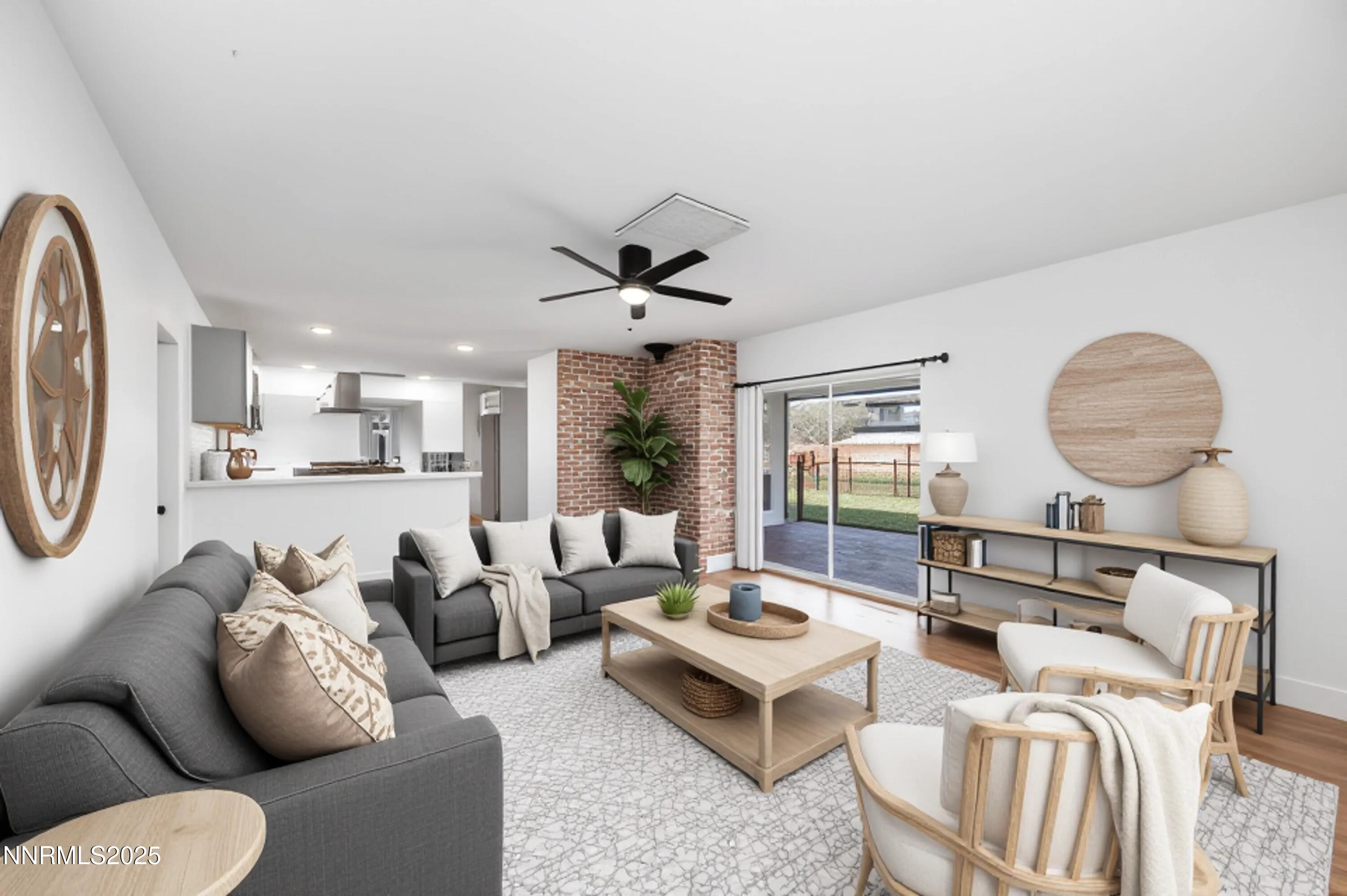 11675 Heartpine Street Reno, NV 89506 - Photo 7 of 38 a living room with furniture a large window and a table