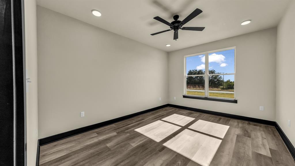 300 Jupiter Trail Weatherford, TX 76088 - Photo 19 of 33 a view of workspace with window and ceiling fan
