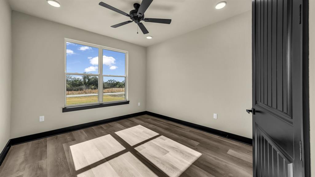 300 Jupiter Trail Weatherford, TX 76088 - Photo 21 of 33 a view of an empty room and window