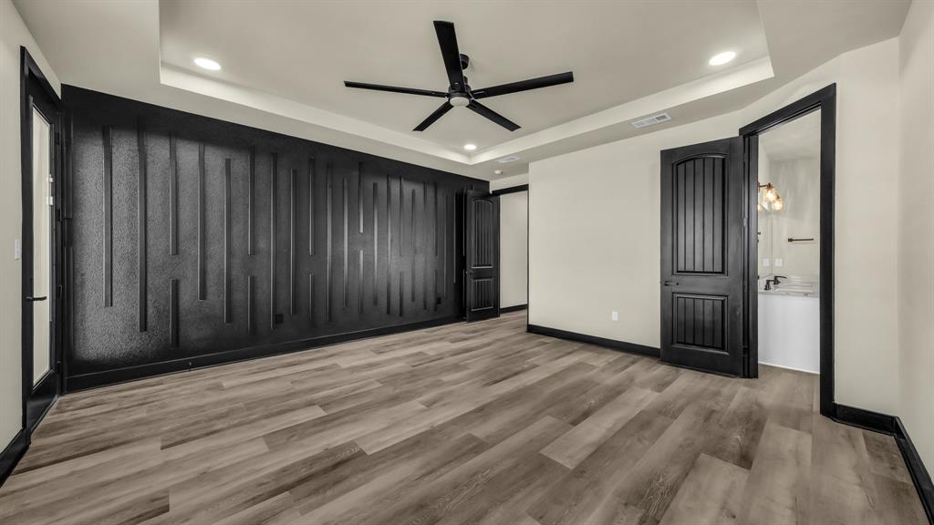 300 Jupiter Trail Weatherford, TX 76088 - Photo 26 of 33 a view of a livingroom with wooden floor