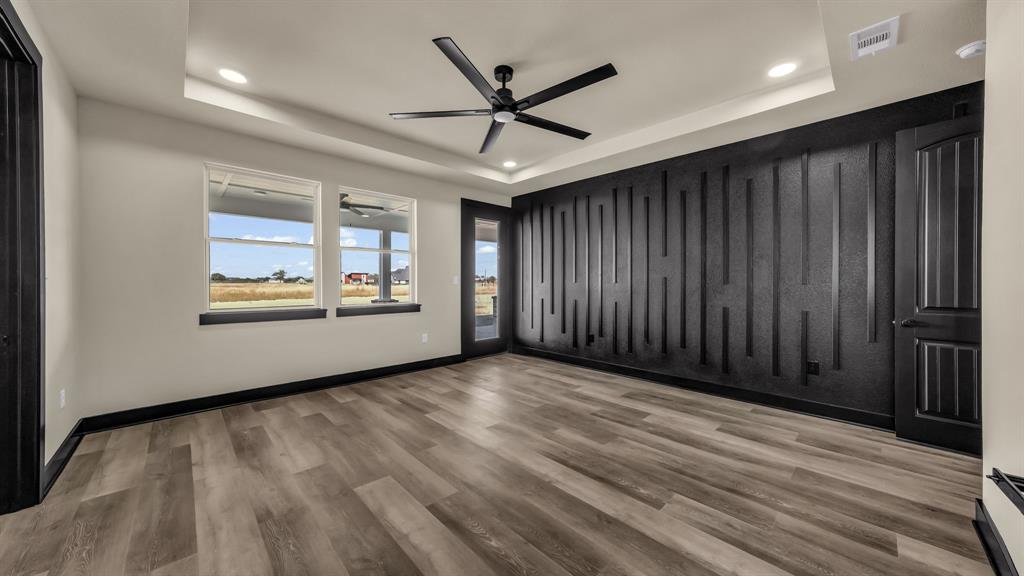 300 Jupiter Trail Weatherford, TX 76088 - Photo 27 of 33 a view of an empty room with a window and cabinet
