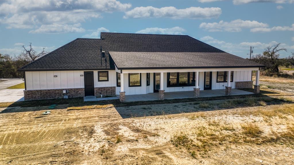 300 Jupiter Trail Weatherford, TX 76088 - Photo 31 of 33 a front view of a house with a yard