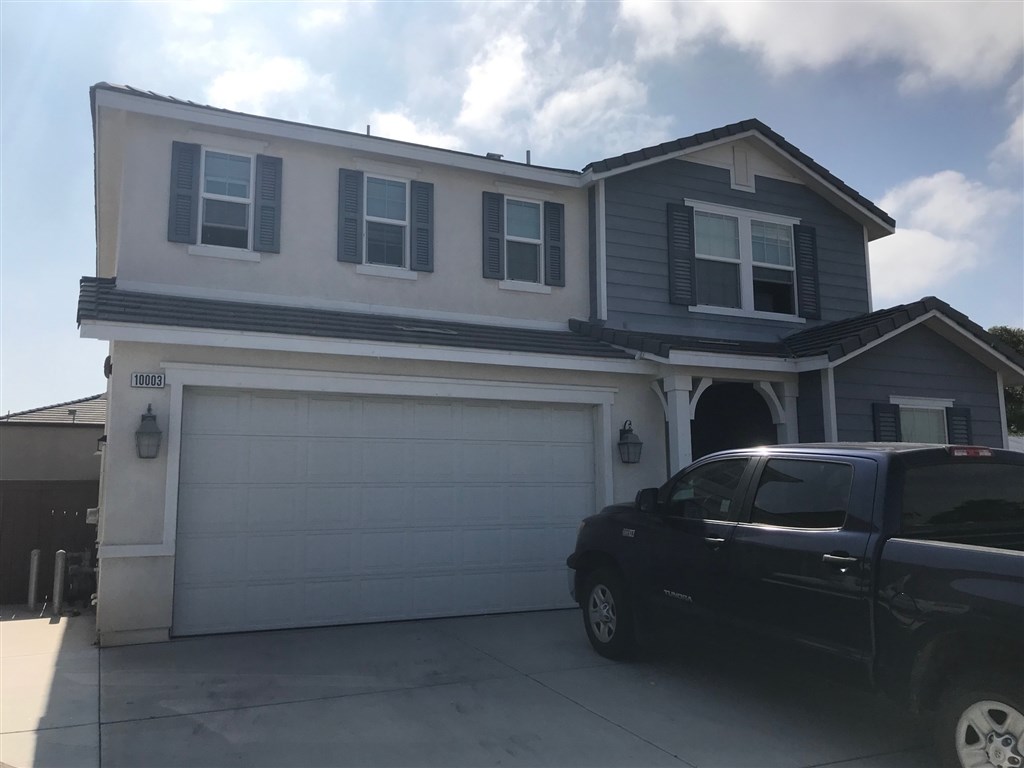10003 Los Ranchitos Road Lakeside, CA 92040 - Photo 1 of 1 a front view of a house with parking