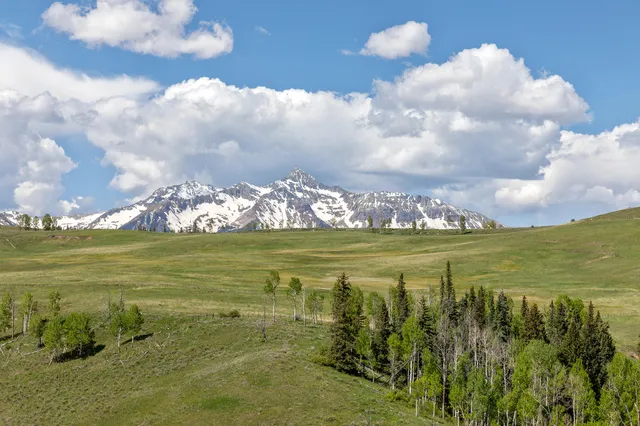 a view of an ocean with boats