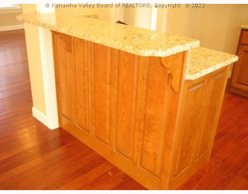 4017 Ridgeview Lane Hurricane, WV 25526 - Photo 4 of 8 Kitchen. Gorgeous cherry breakfast bar with granite counter tops.