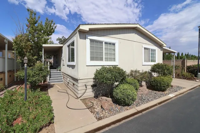 a front view of a house with porch