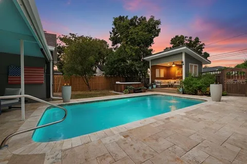 a view of a house with a swimming pool