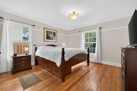 a view of a livingroom with wooden floor
