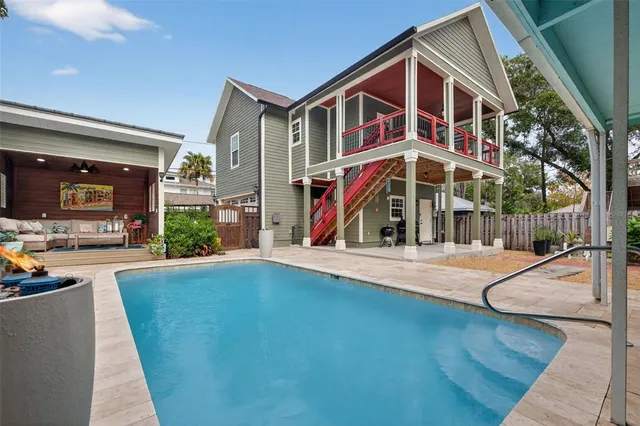 a view of a house with swimming pool