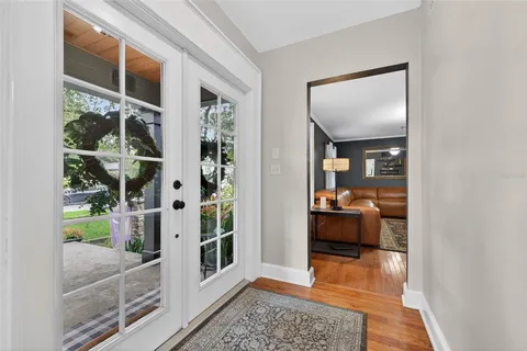 a view of living room with furniture and window