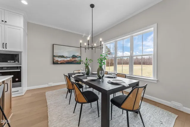 a bathroom with a shower a toilet and sink