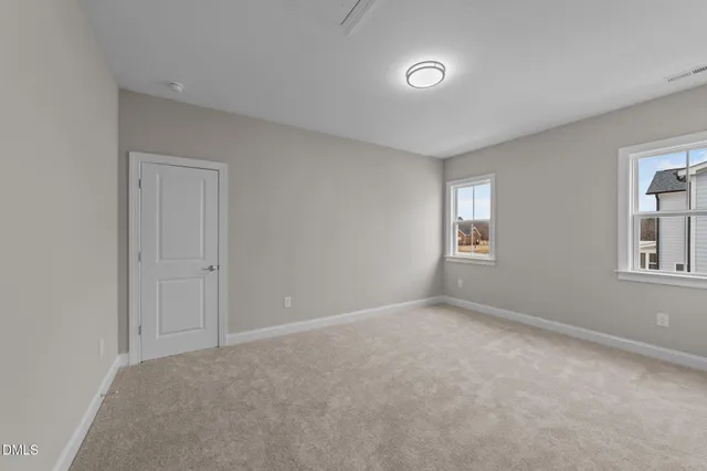 a view of a house with a window and wooden floor