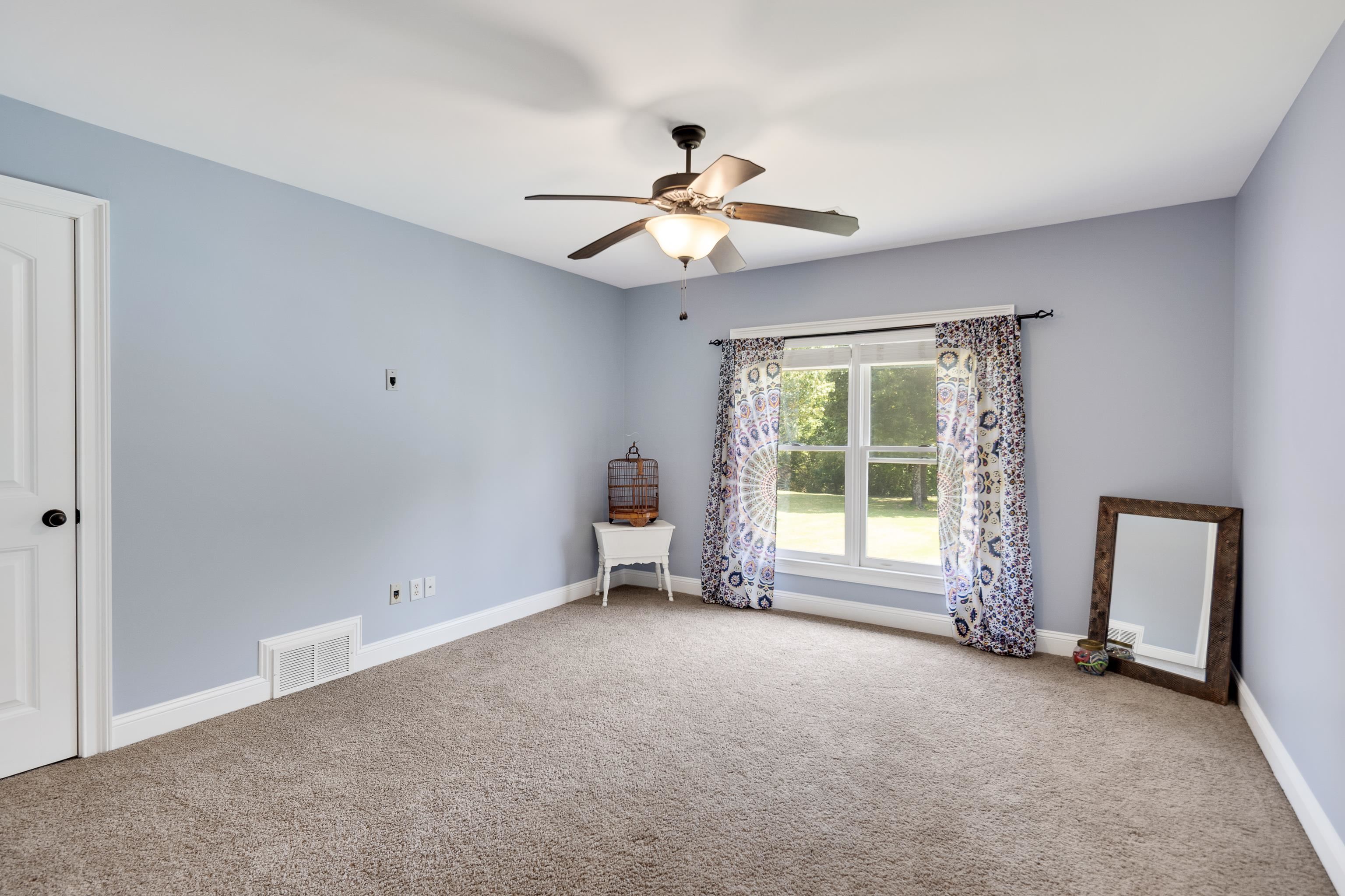 9028 Osborntown Road Arlington, TN 38002 - Photo 34 of 40 a view of an empty room with a window