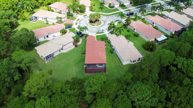 an aerial view of a house with a garden