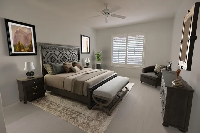 a bedroom with a bed and a couch