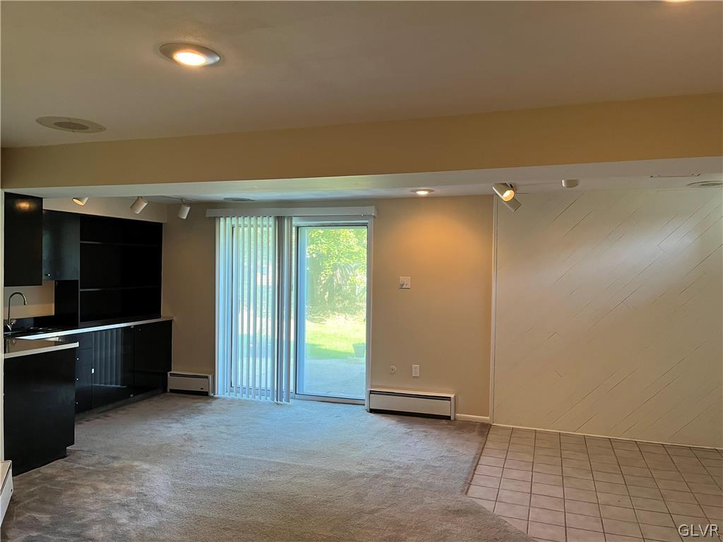 1833 Minesite Road Allentown, PA 18103 - Photo 16 of 22 Finished walk-out basement with wet bar and slidin