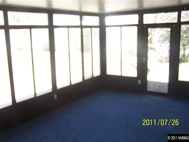17255 Waxwing Street Reno, NV 89508 - Photo 7 of 13 a view of an empty room with a window