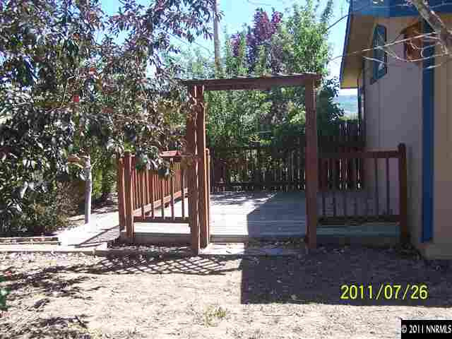 17255 Waxwing Street Reno, NV 89508 - Photo 8 of 13 a view of a entrance gate of a house