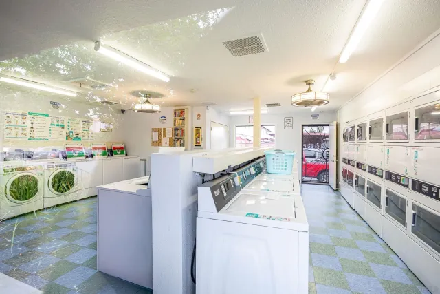 a kitchen with stainless steel appliances granite countertop a stove and cabinets