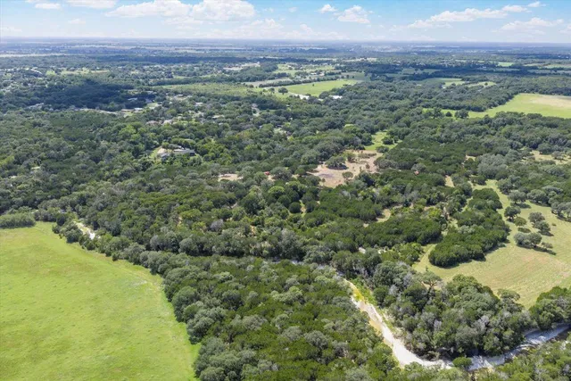a view of a lake with a city