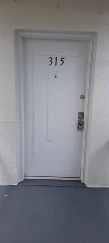 a view of a door front of a house