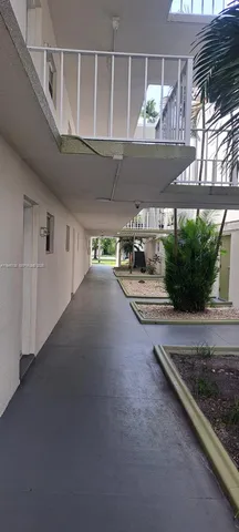 a view of multiple house with a yard