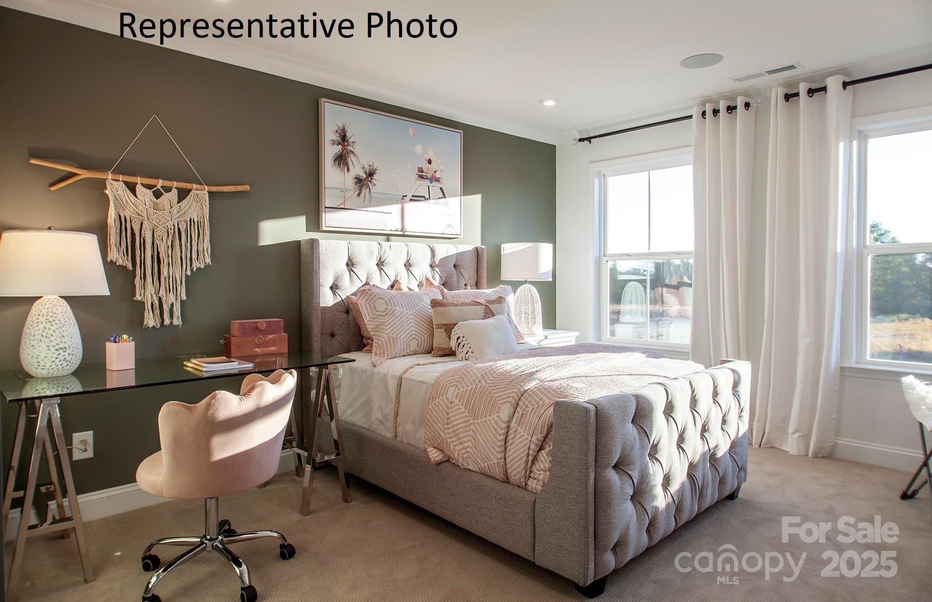 4707 Formation Court, Unit 49 Lancaster, SC 29720 - Photo 19 of 21 a bed room with a bed and a chair