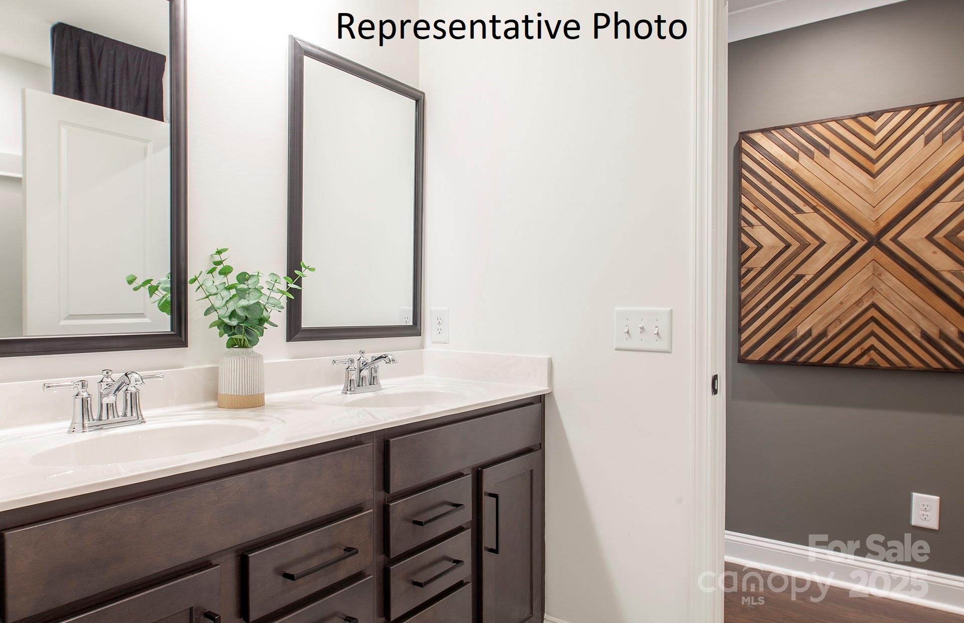 4707 Formation Court, Unit 49 Lancaster, SC 29720 - Photo 20 of 21 a bathroom with a sink and a mirror