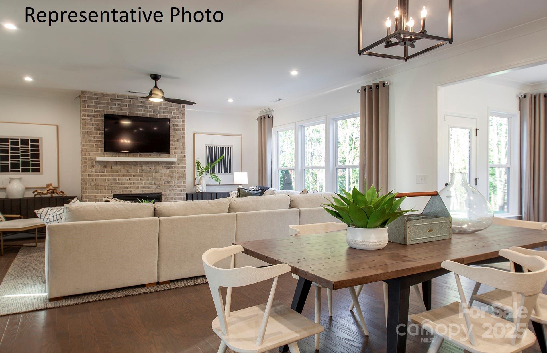 4707 Formation Court, Unit 49 Lancaster, SC 29720 - Photo 10 of 21 a living room with furniture and a flat screen tv