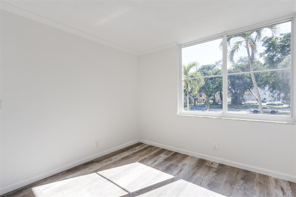 9410 Live Oak Place, Unit 203 Davie, FL 33324 - Photo 19 of 40 an empty room with a window