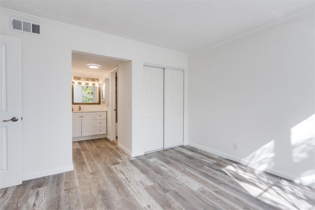 9410 Live Oak Place, Unit 203 Davie, FL 33324 - Photo 25 of 40 a view of a livingroom with wooden floor and a sink