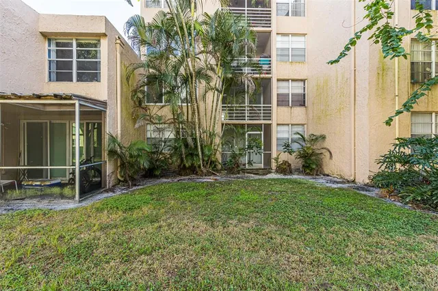 a view of swimming pool with an outdoor space and seating area