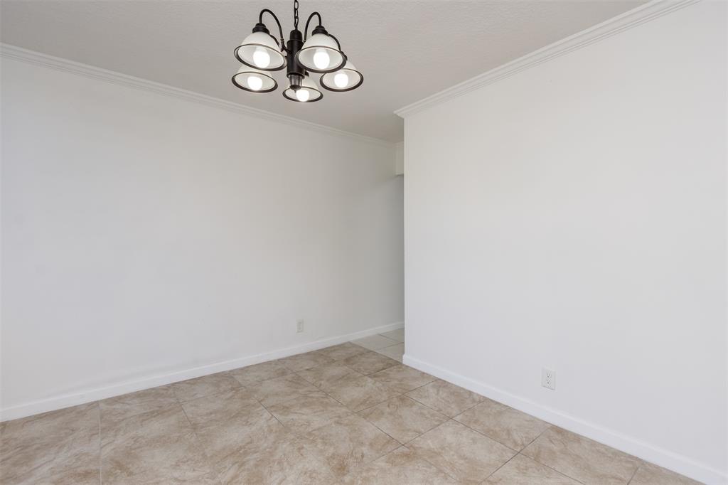 9410 Live Oak Place, Unit 203 Davie, FL 33324 - Photo 9 of 40 a view of a rack on the wall